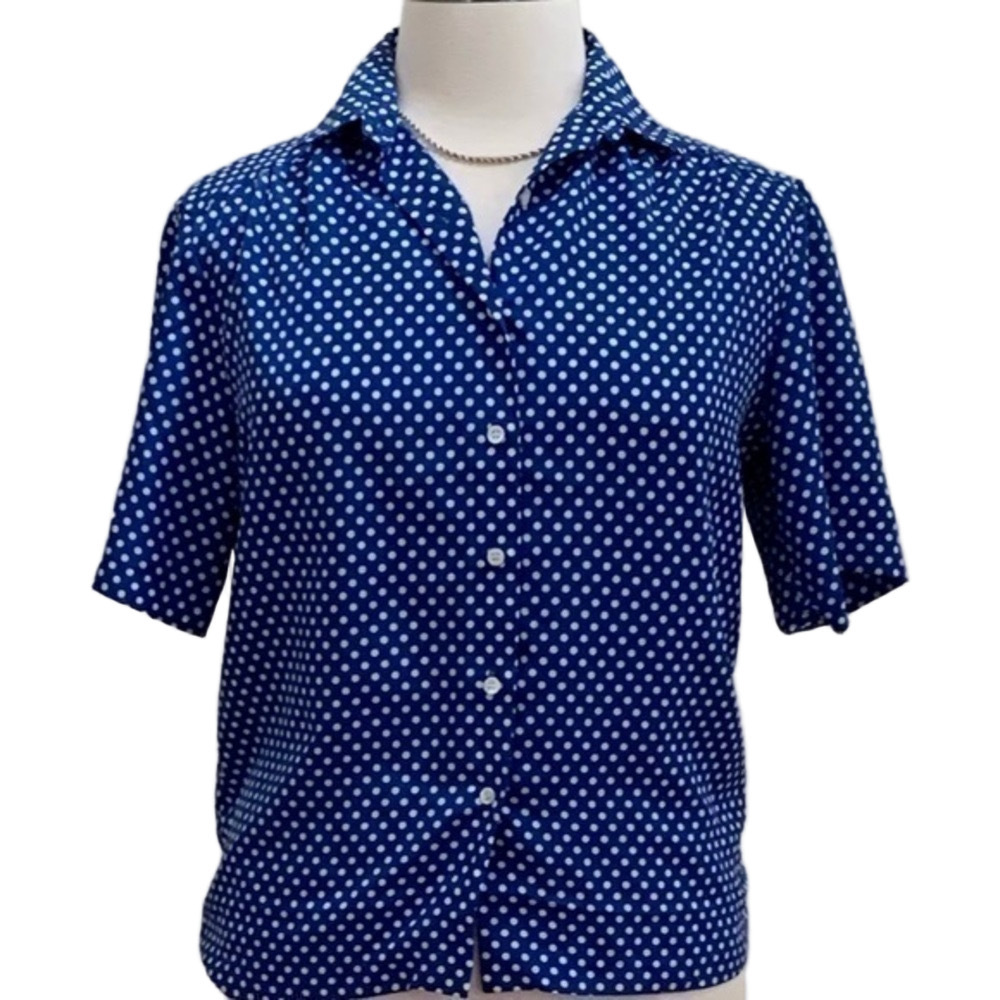 Russ, Royal blue and white dot shirt.